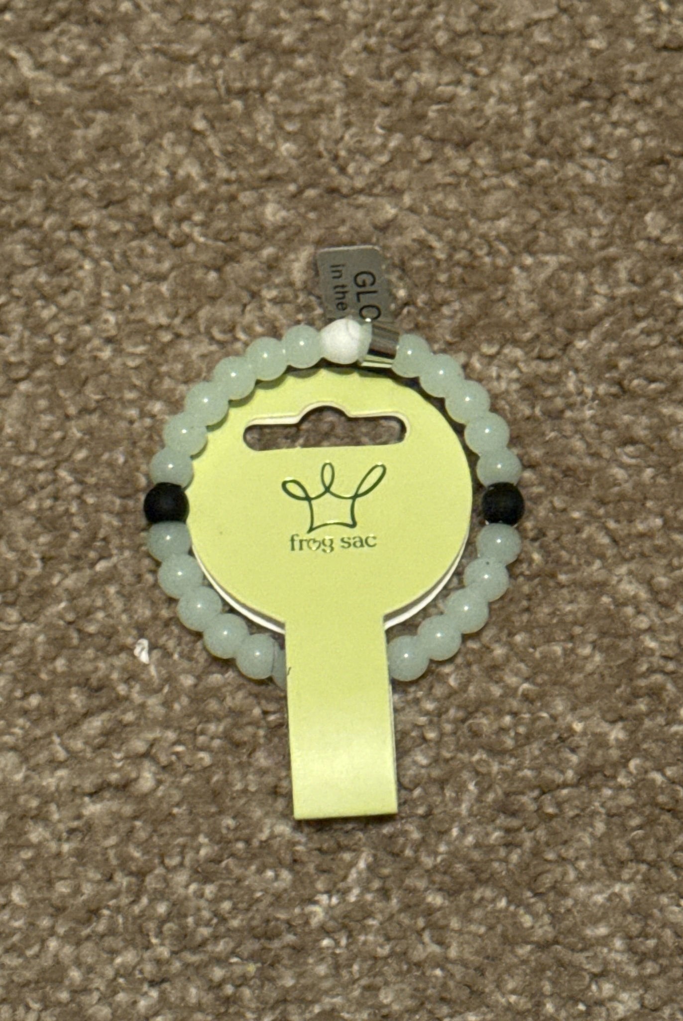 Frog sack glow in dark bracelet - Deadwood South Boutique & Company LLC