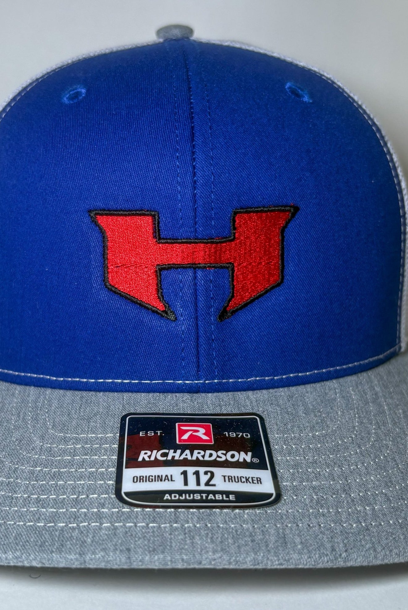 Henderson H Caps - Deadwood South Boutique & Company LLC