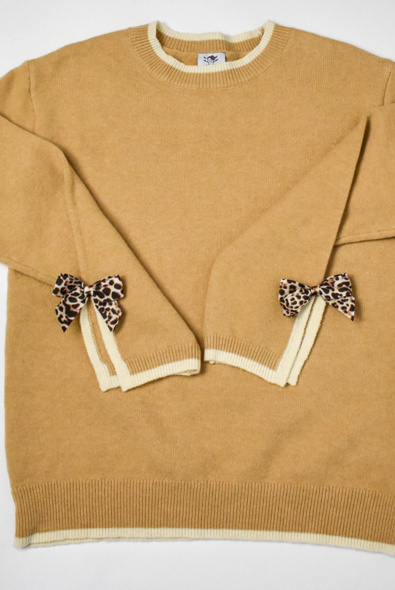 The Madelyne Sweater w/ Leopard Bow Detail - Deadwood South Boutique & Company LLC