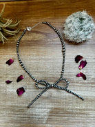 Bijoux Bow Sterling Silver Necklace-Jewelry-Deadwood South Boutique & Company LLC-Deadwood South Boutique, Women's Fashion Boutique in Henderson, TX