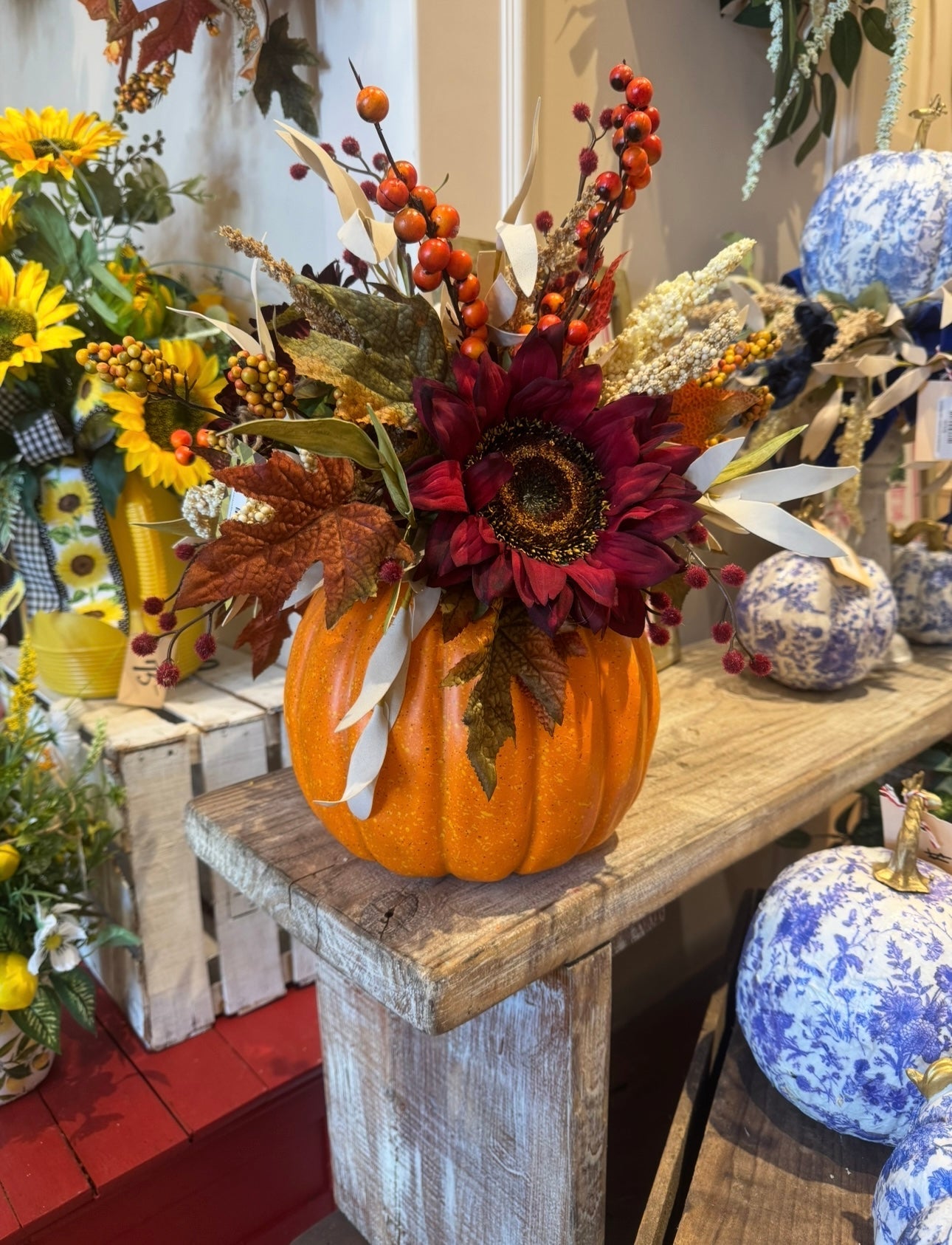 Orange pumpkin arrangement - Deadwood South Boutique & Company LLC