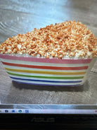Rainbow coconut topping squishy cake - Deadwood South Boutique & Company LLC