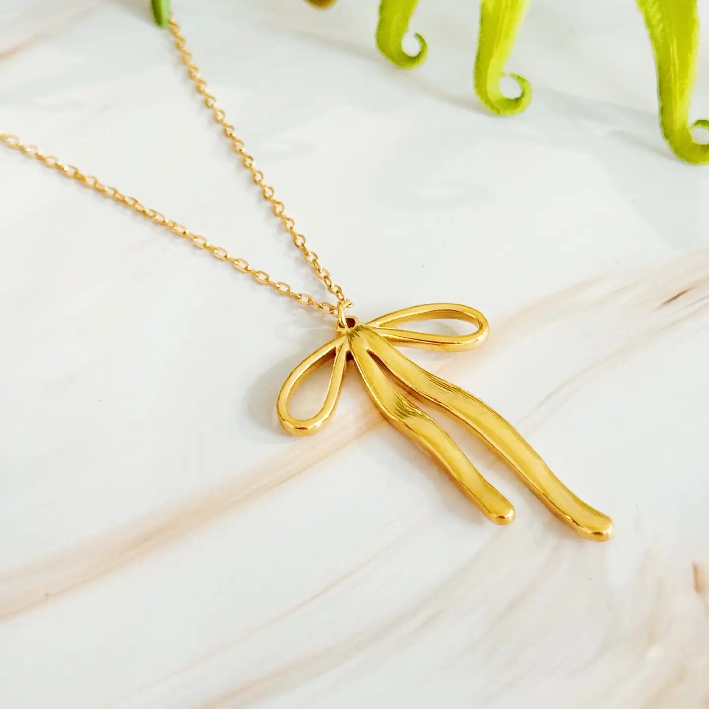Stella Bow Pendant Necklace - Deadwood South Boutique & Company LLC
