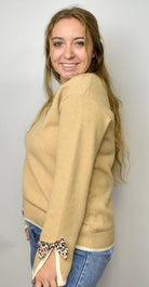 The Madelyne Sweater w/ Leopard Bow Detail - Deadwood South Boutique & Company LLC