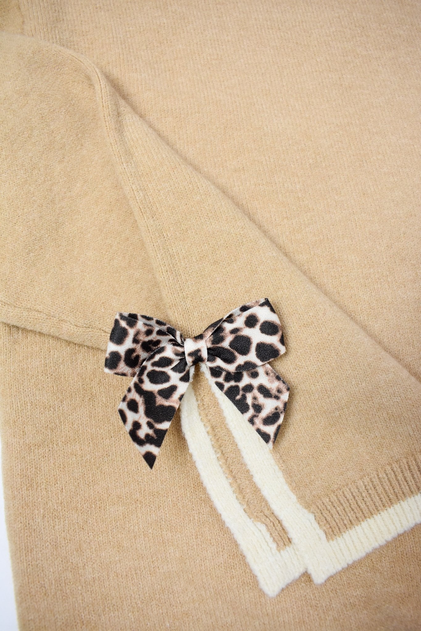 The Madelyne Sweater w/ Leopard Bow Detail - Deadwood South Boutique & Company LLC