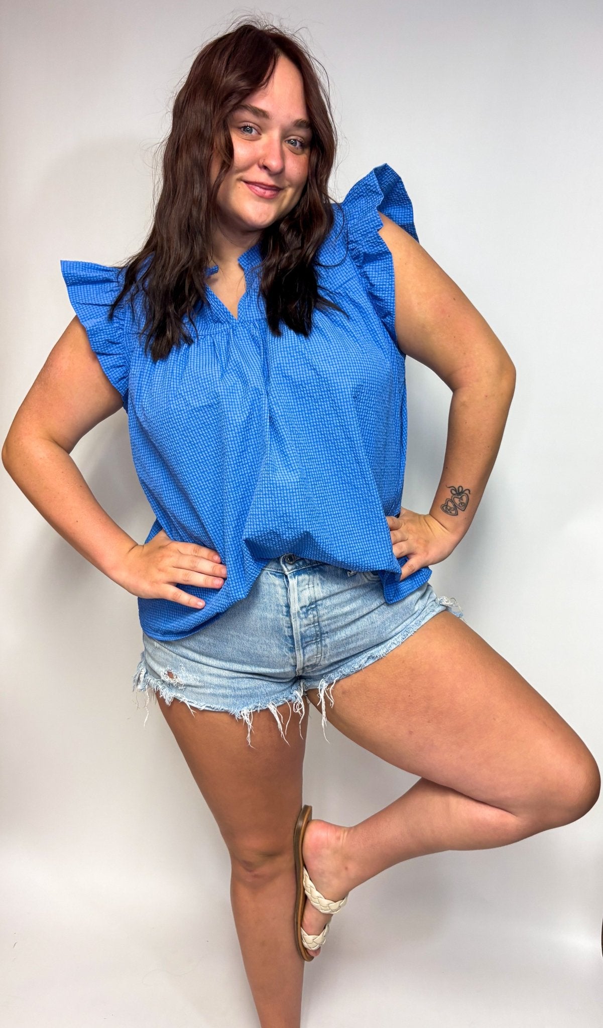 The Wendi Checkered Ruffle Sleeve Top - Deadwood South Boutique & Company LLC